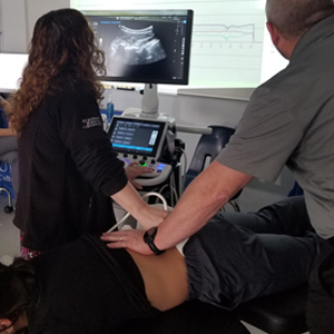 picture Fort Wayne chiropractic ultrasound imaging of spinal vertebrae during treatment